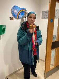 Alison ringing the bell at The Christie