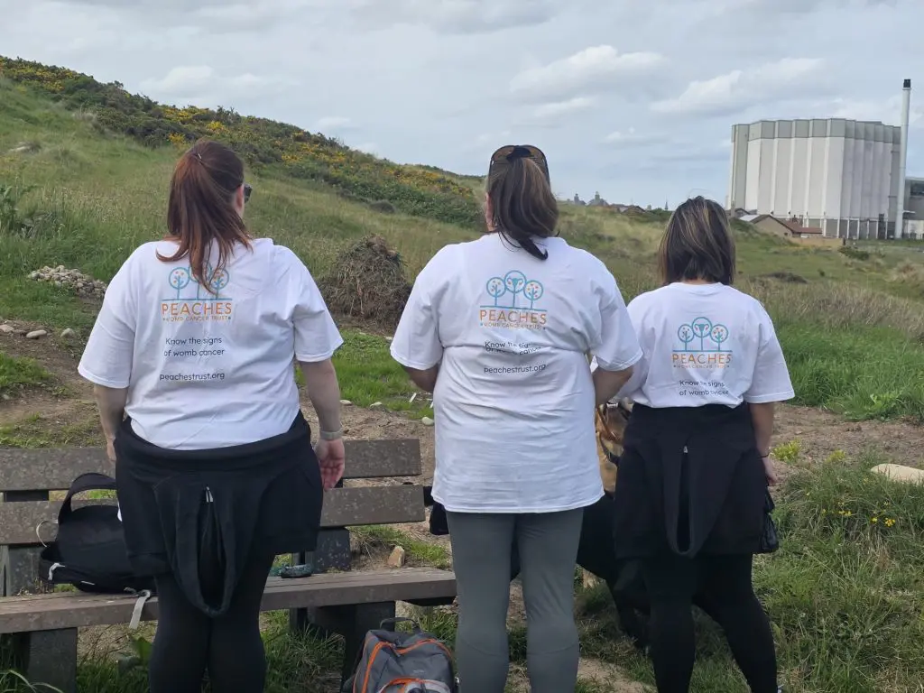 training walk, sporting Peaches' T-shirts